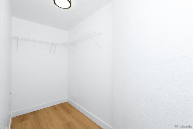 3035 Oneal Pkwy Unit 20V, Boulder, CO 80301 - walk in closet featuring light wood-style floors