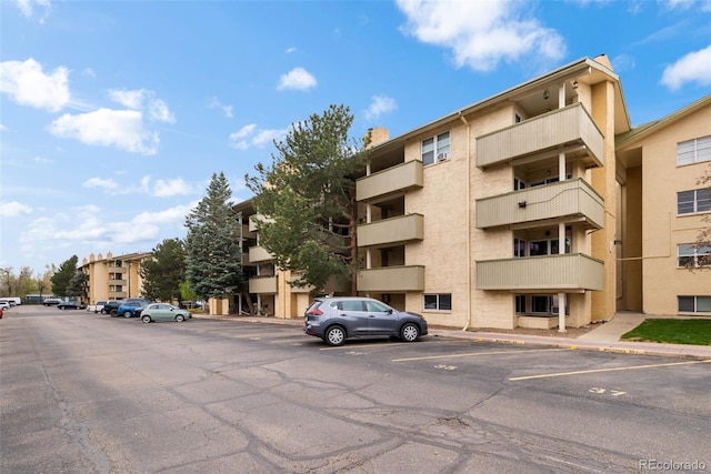 3035 Oneal Pkwy Unit 20V, Boulder, CO 80301 - view of apartment building / complex featuring uncovered parking