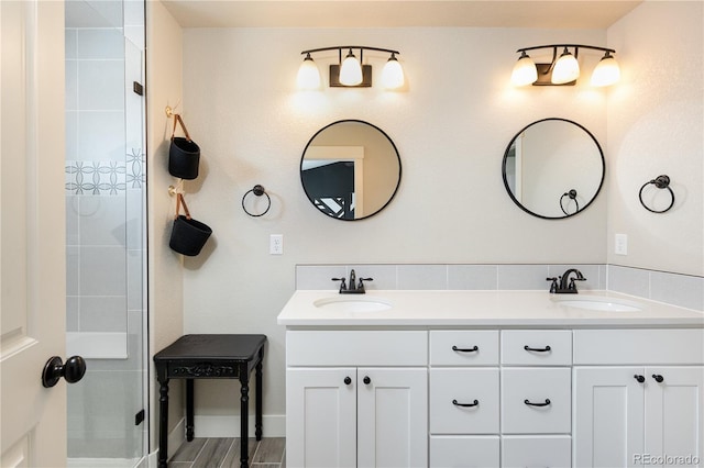 101 Wake St, Frederick, CO 80530 - bathroom featuring double vanity and a shower