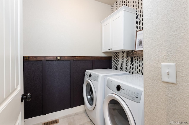 101 Wake St, Frederick, CO 80530 - laundry room featuring washer and dryer and a wainscoted wall