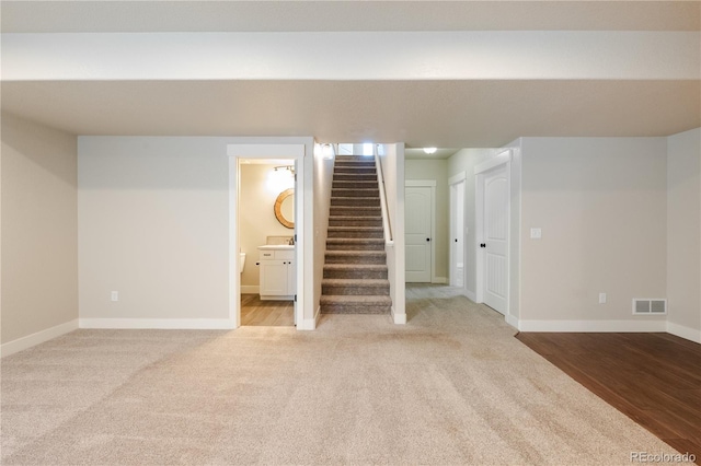 101 Wake St, Frederick, CO 80530 - finished basement featuring stairway and carpet