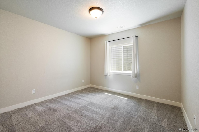101 Wake St, Frederick, CO 80530 - carpeted spare room featuring baseboards