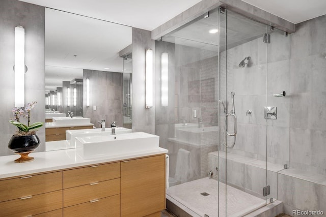 1610 Little Raven St Unit 302, Denver, CO 80202 - bathroom with vanity and a shower stall