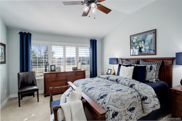 carpeted bedroom featuring lofted ceiling, ceiling fan, and baseboards