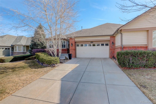 ranch-style house with an attached garage, brick siding, driveway, roof with shingles, and a front lawn