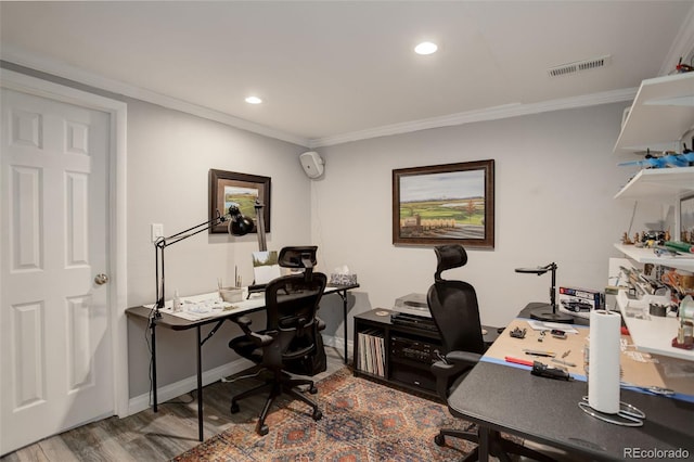 office featuring recessed lighting, wood finished floors, visible vents, baseboards, and crown molding