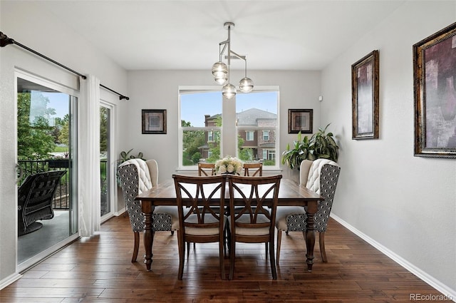681 W Burgundy St Unit A, Highlands Ranch, CO 80129 - dining area with healthy amount of natural light, dark wood-style flooring, and baseboards