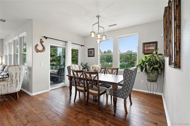 681 W Burgundy St Unit A, Highlands Ranch, CO 80129 - dining area featuring healthy amount of natural light, baseboards, and wood finished floors