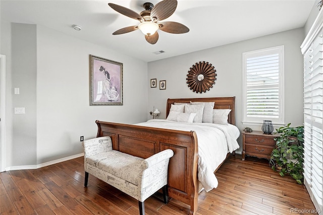 681 W Burgundy St Unit A, Highlands Ranch, CO 80129 - bedroom with hardwood / wood-style flooring, ceiling fan, and baseboards