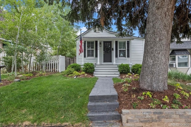 bungalow with a front lawn