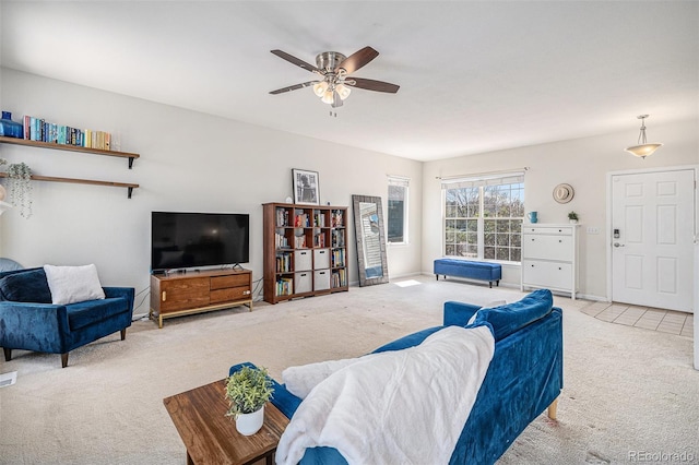 3543 S Ceylon Way, Aurora, CO 80013 - living room featuring light carpet and a ceiling fan