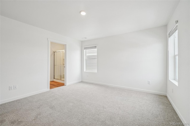 unfurnished room with carpet