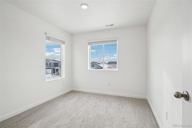 view of carpeted spare room