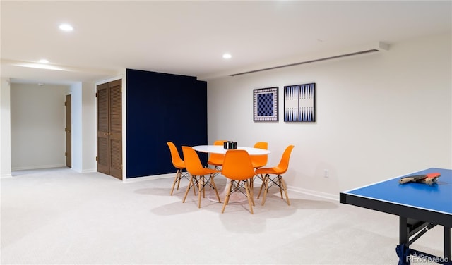 dining area featuring recessed lighting, baseboards, and carpet