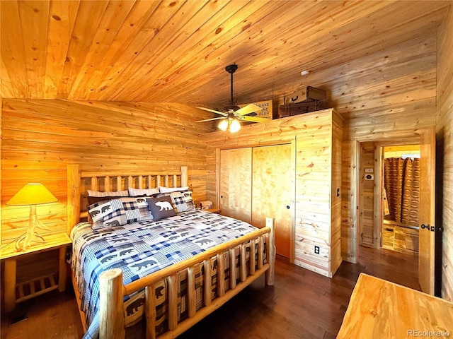 bedroom featuring wood ceiling, dark hardwood / wood-style flooring, vaulted ceiling, and ceiling fan