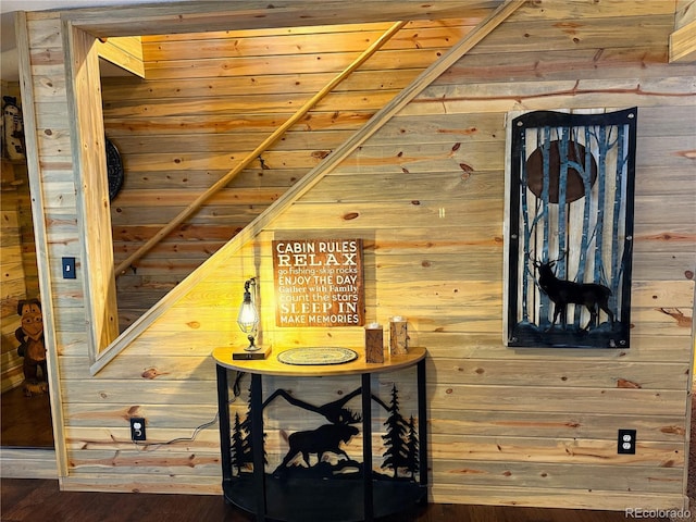 interior space featuring wooden walls and wood-type flooring