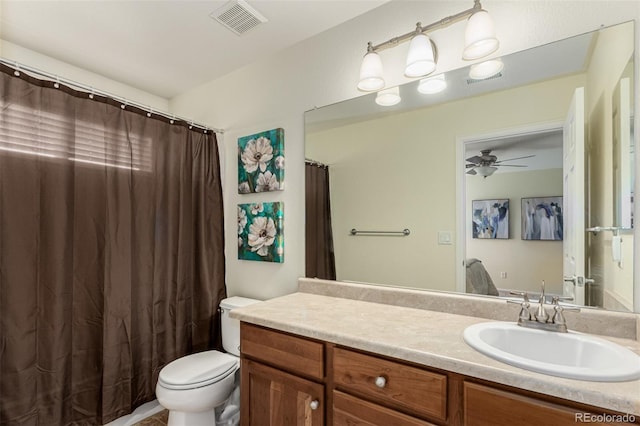 7852 Solstice Way, Castle Rock, CO 80108 - bathroom with toilet, vanity, a ceiling fan, and a shower with curtain