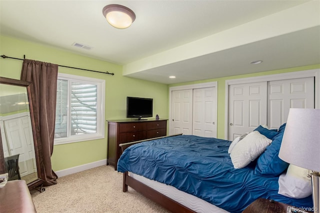 7852 Solstice Way, Castle Rock, CO 80108 - bedroom featuring multiple closets, baseboards, light carpet, and recessed lighting