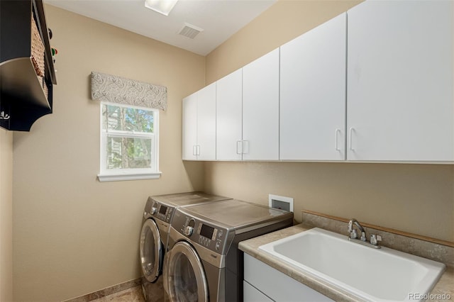 7852 Solstice Way, Castle Rock, CO 80108 - laundry area featuring cabinet space, separate washer and dryer, and baseboards