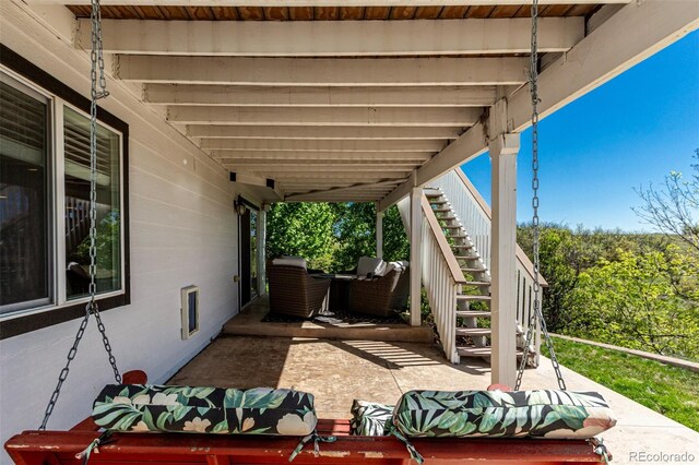 7852 Solstice Way, Castle Rock, CO 80108 - view of patio / terrace with stairs and an outdoor living space