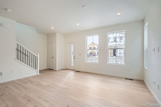 entrance foyer featuring light hardwood / wood-style floors