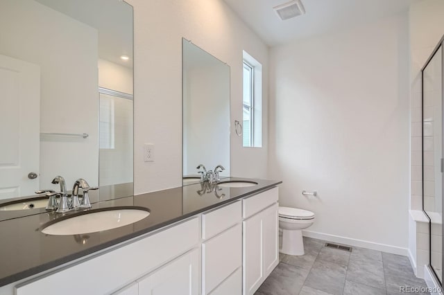 14556 W 91st Ave Unit D, Arvada, CO 80005 - bathroom featuring double vanity and tiled shower