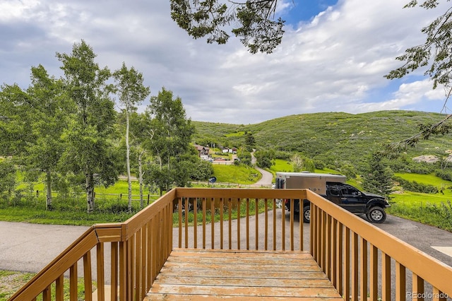 8758 S Murphy Gulch Rd, Littleton, CO 80127 - wooden terrace featuring a mountain view