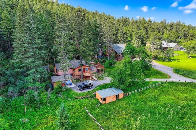 8758 S Murphy Gulch Rd, Littleton, CO 80127 - view of subject property with a forest