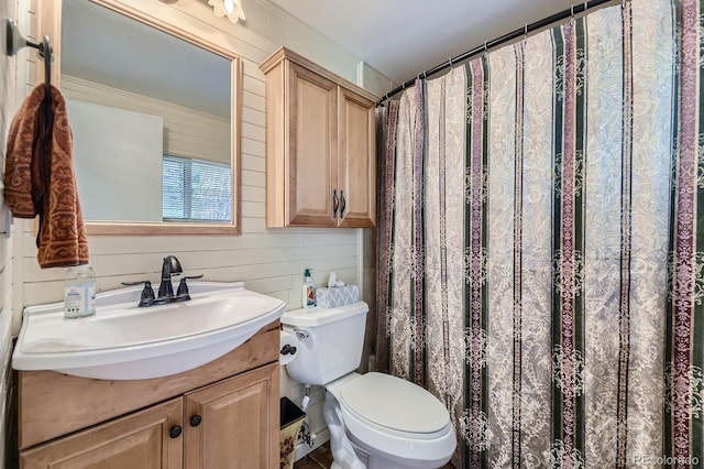 8758 S Murphy Gulch Rd, Littleton, CO 80127 - bathroom with vanity, wood walls, and a shower with curtain