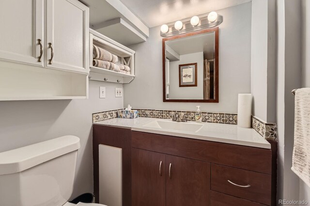 8758 S Murphy Gulch Rd, Littleton, CO 80127 - bathroom with vanity and toilet