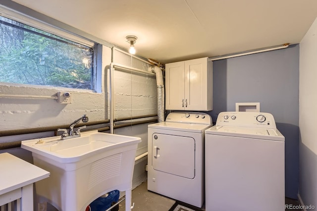 8758 S Murphy Gulch Rd, Littleton, CO 80127 - washroom featuring independent washer and dryer and cabinet space