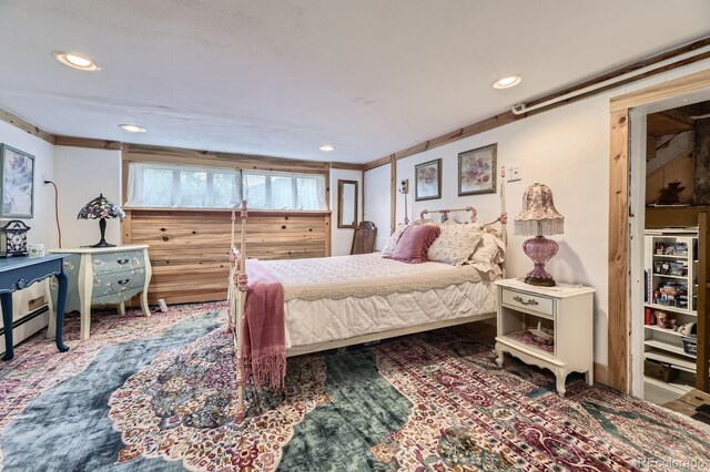 8758 S Murphy Gulch Rd, Littleton, CO 80127 - bedroom with recessed lighting and a baseboard heating unit