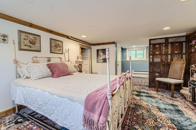 8758 S Murphy Gulch Rd, Littleton, CO 80127 - bedroom featuring baseboard heating and recessed lighting