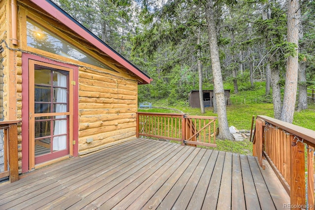 8758 S Murphy Gulch Rd, Littleton, CO 80127 - wooden terrace featuring an outbuilding
