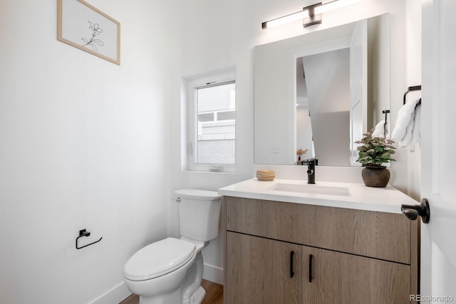 5227 N Eliot St, Denver, CO 80221 - bathroom with vanity and toilet