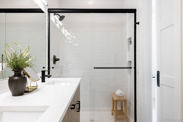 5227 N Eliot St, Denver, CO 80221 - full bathroom with double vanity and a tile shower