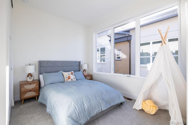 5227 N Eliot St, Denver, CO 80221 - carpeted bedroom with multiple windows