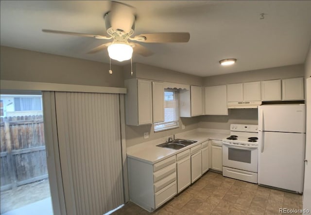 6600 Knox Ct, Denver, CO 80221 - kitchen featuring white appliances, a sink, under cabinet range hood, light countertops, and a ceiling fan