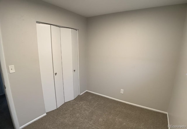 6600 Knox Ct, Denver, CO 80221 - unfurnished bedroom featuring carpet floors, a closet, and baseboards