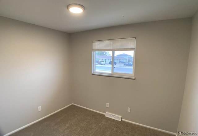6600 Knox Ct, Denver, CO 80221 - empty room with dark carpet and baseboards