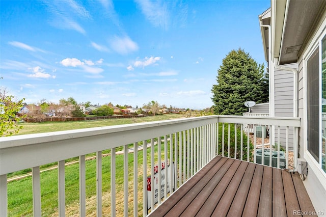 1461 S Danube Way Unit 104, Aurora, CO 80017 - wooden terrace with a lawn