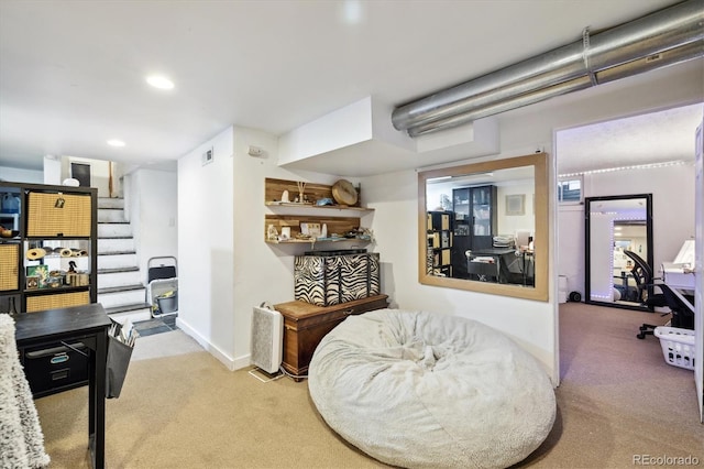 living area with carpet floors