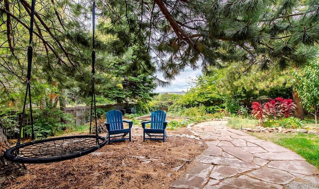 view of patio featuring fence
