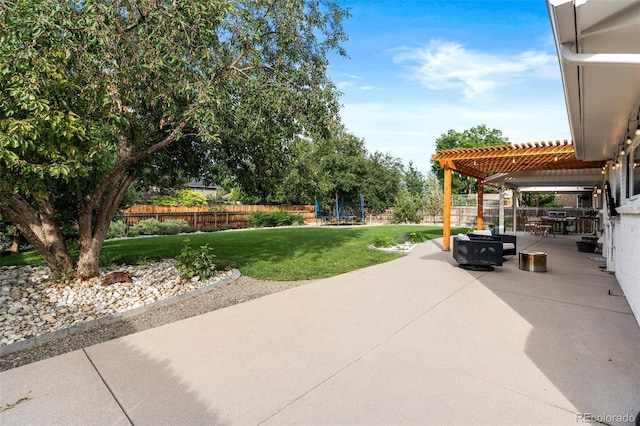 view of patio / terrace with a pergola and a trampoline