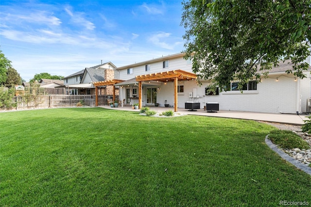 rear view of property with cooling unit, a yard, a pergola, and a patio