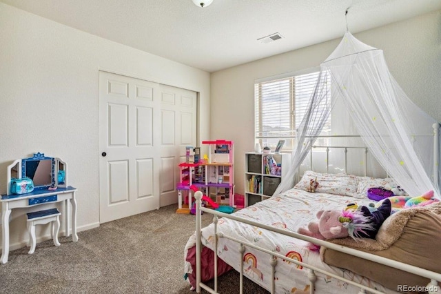 bedroom with visible vents and carpet floors