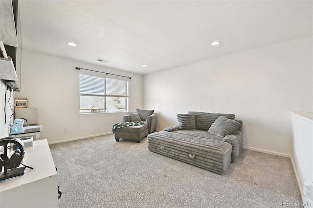 interior space featuring recessed lighting, visible vents, baseboards, and carpet floors