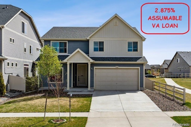 5352 Truckee St, Denver, CO 80249 - view of front of house with a front lawn, driveway, board and batten siding, an attached garage, and fence