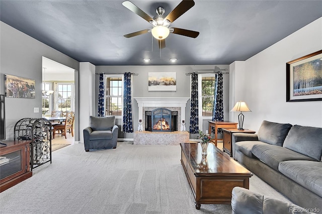 41479 Countryside Cir, Parker, CO 80138 - living room featuring a ceiling fan, carpet floors, and a fireplace
