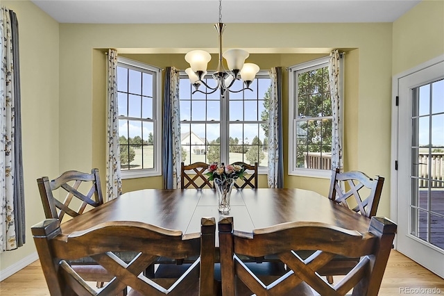 41479 Countryside Cir, Parker, CO 80138 - dining room with a chandelier and light wood-style floors